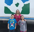 Jessica Wright and her children in front of the mobile unit