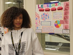 Gianna Jackson and her cancer research poster