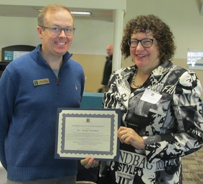 Dr. Donna Feldman with associate dean and award