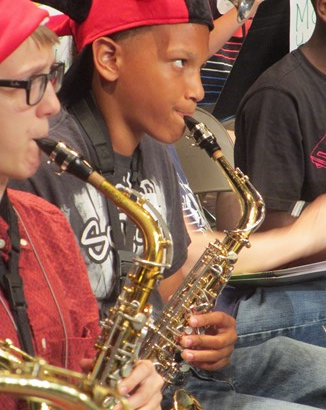 Students playing saxophones