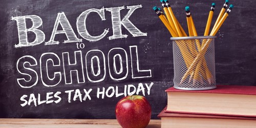 Sales Tax Holiday on chalkboard with pencils and apple