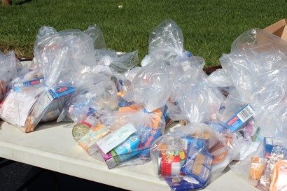 Bags with food on table