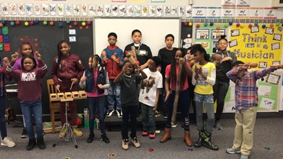 Music class kids playing instruments