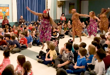 students watching african dance