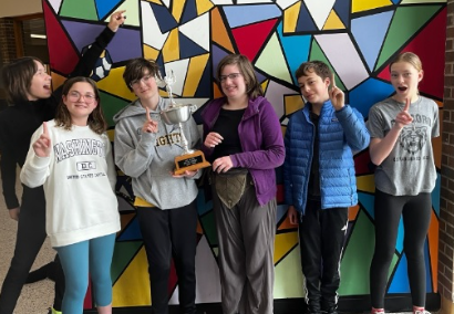 group of students with trophy
