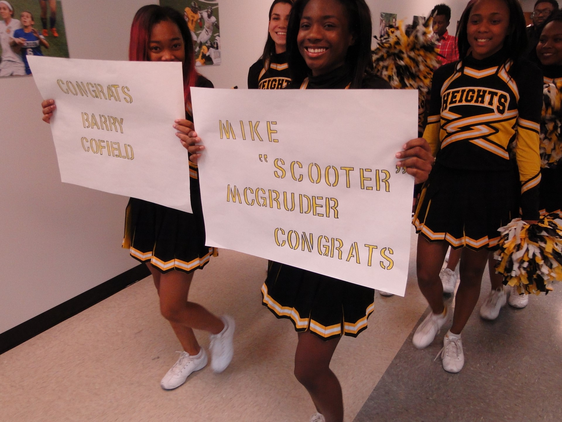 Cheerleaders lead the parade