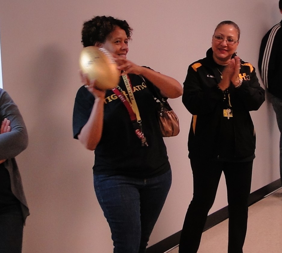 Teacher Vicki Larkins-Forte caught the Golden Football