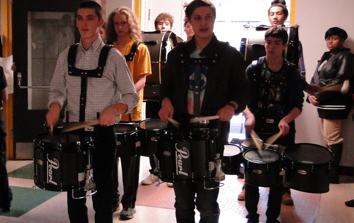 Drum line announced the parade as it traveled through the school