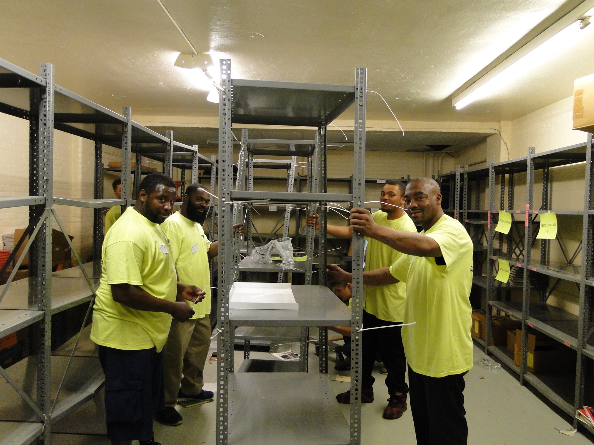 Preparing to move book shelves from the textbook storage room