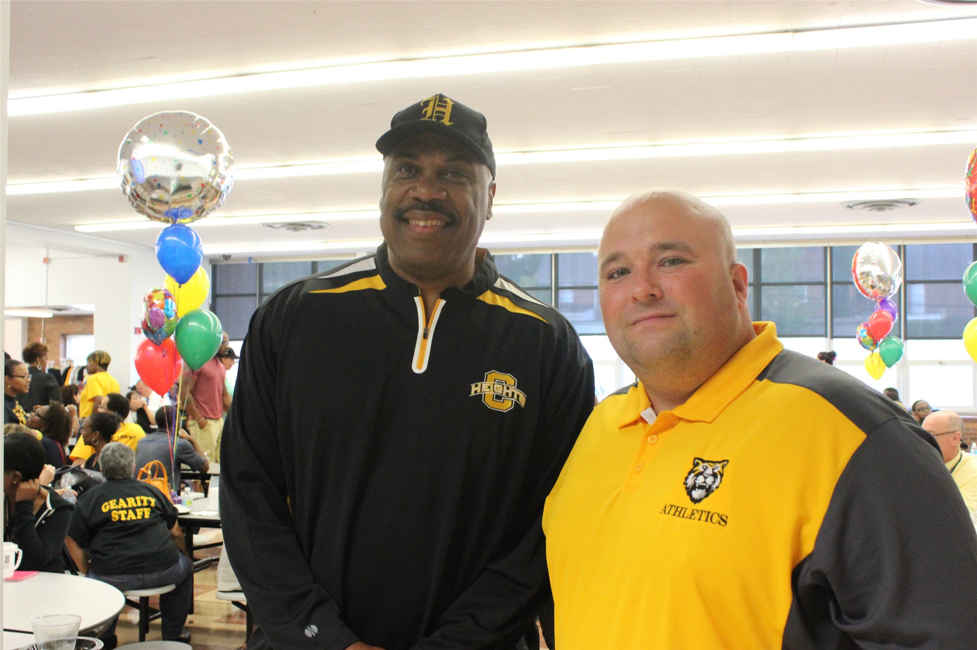 Heights High Supervisor of Athletics Dwight Hollins and Teacher Sean Evans