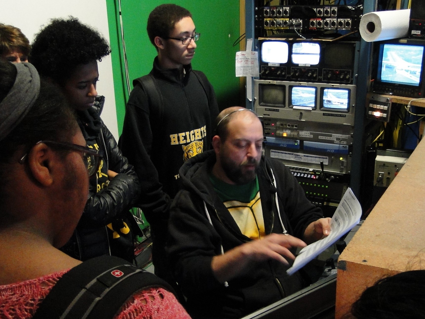 Steve Myerson is the Camera Robotics Operator & Audio Controller - he is explaining his role to students. 