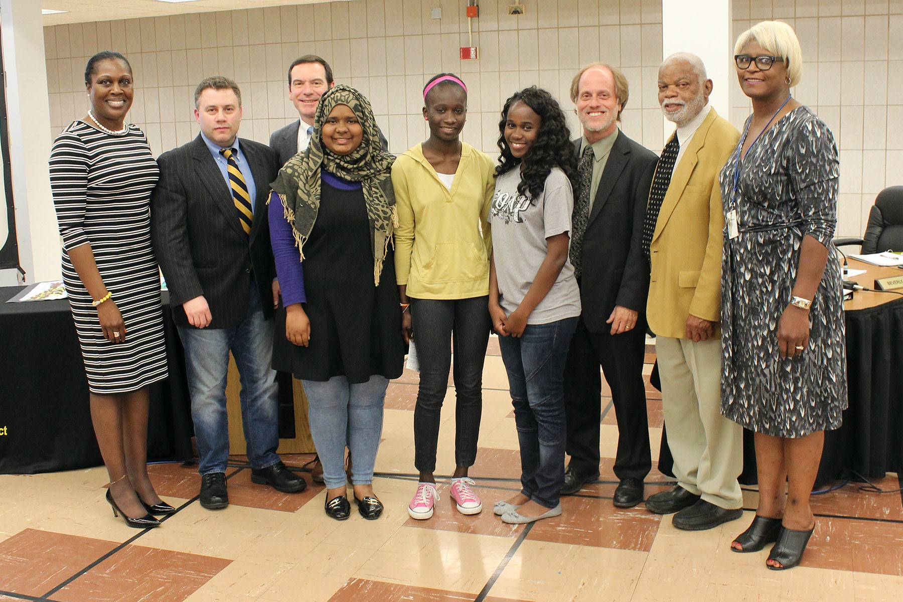 Three foreign exchange students from the high school&#39;s AFS program spoke at the meeting.