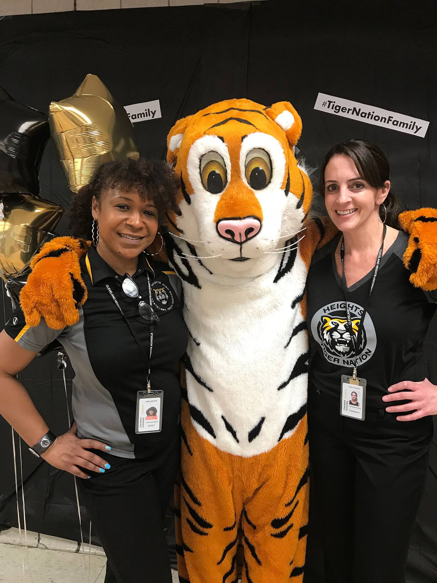 Tiger mascot with CH-UH staff