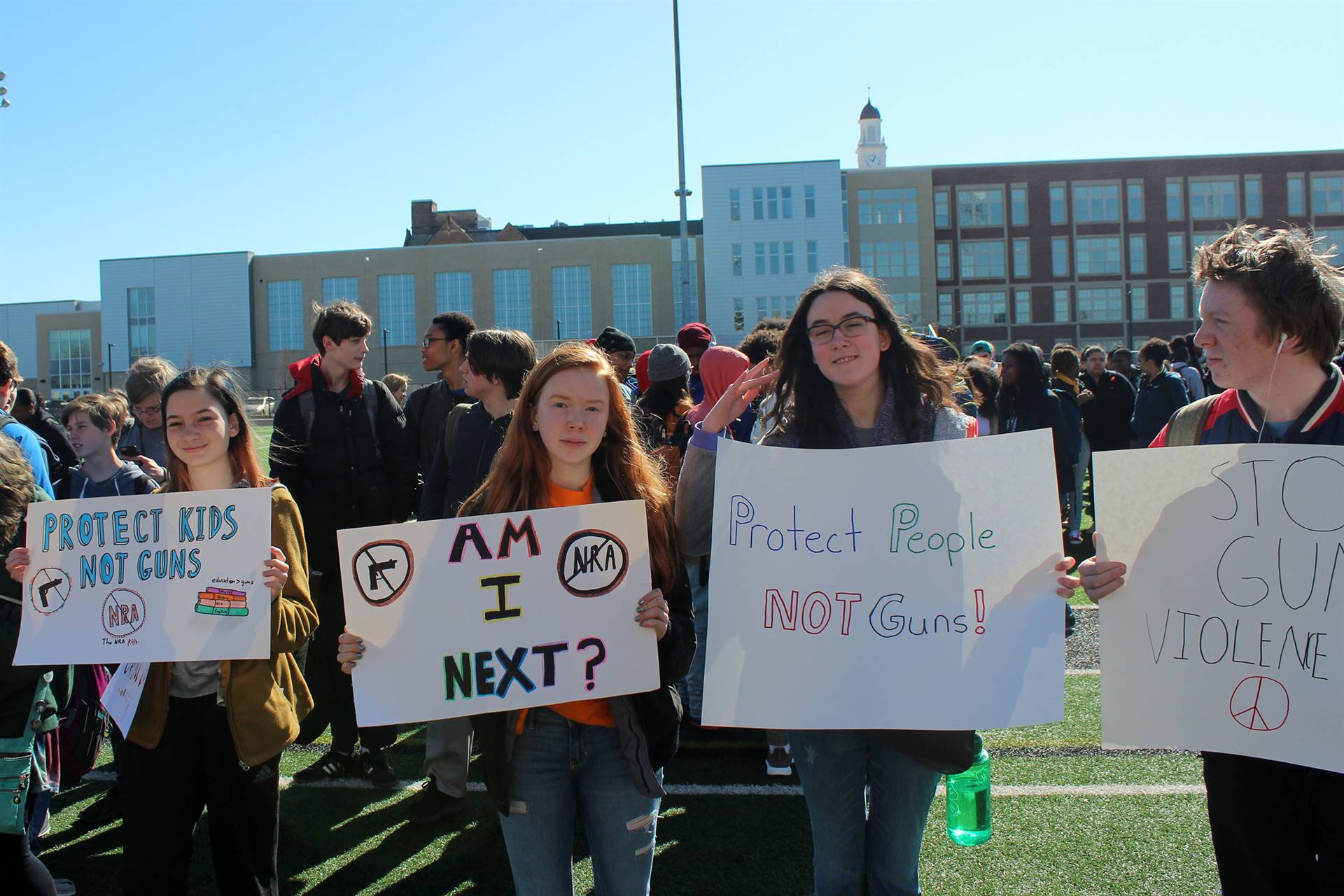 Heights High students with signs