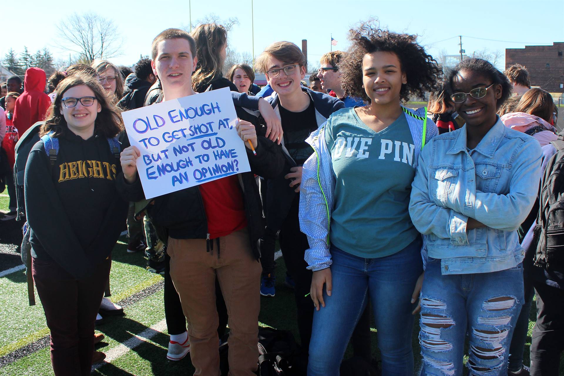 Heights High students with signs