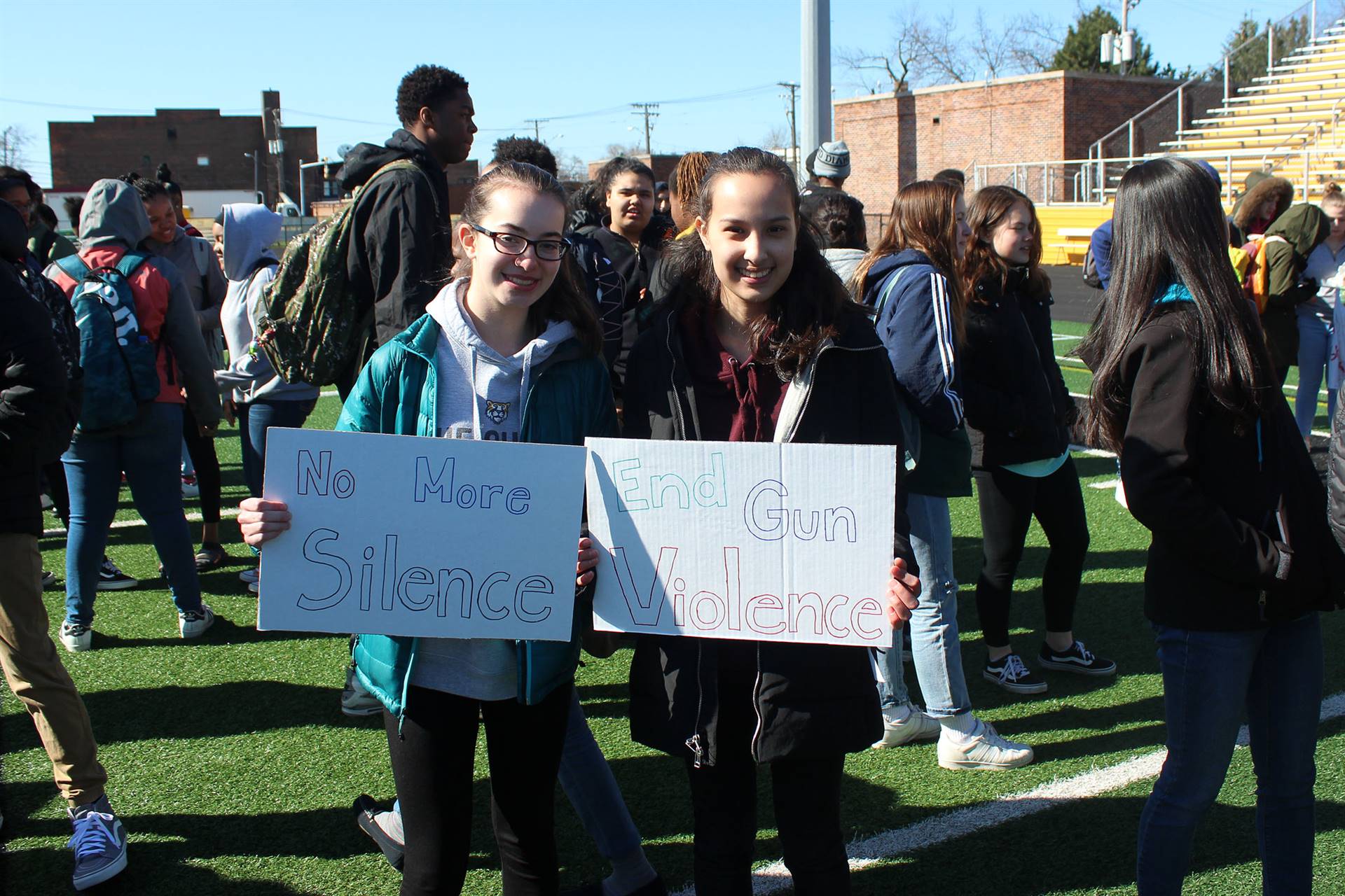 Heights High students with signs