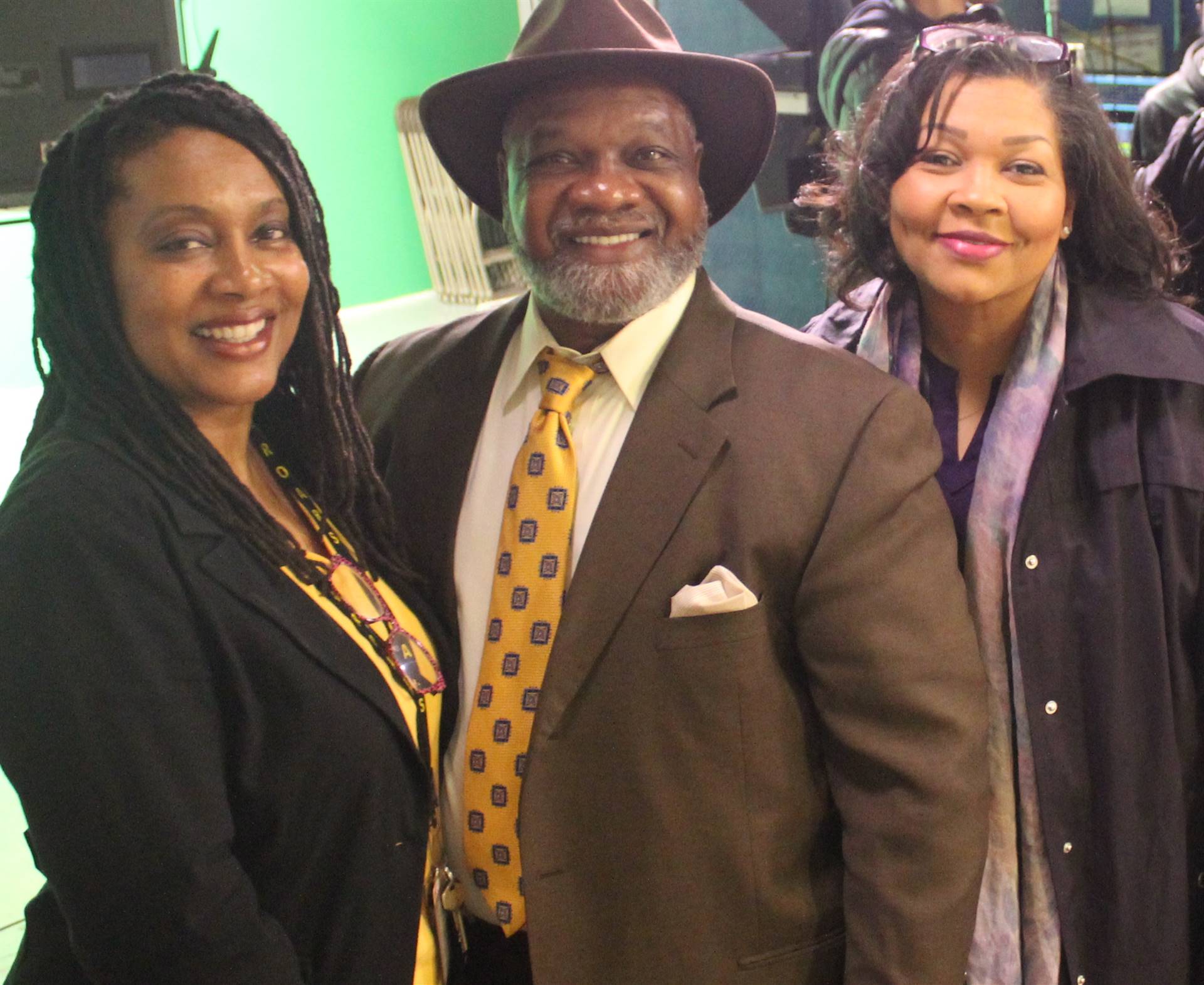 Cynthia Booker, Harry Boomer, (anchor, reporter and producer) and Michelle Phelps, L-R.