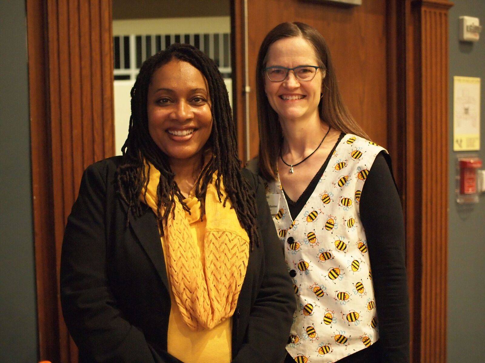 Two females smiling