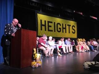 All teams on stage with presenter on the left