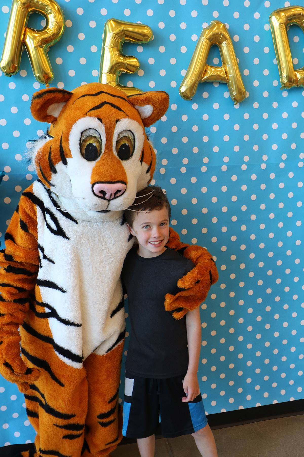 Tiger and boy at CH-UH Family Literacy Night