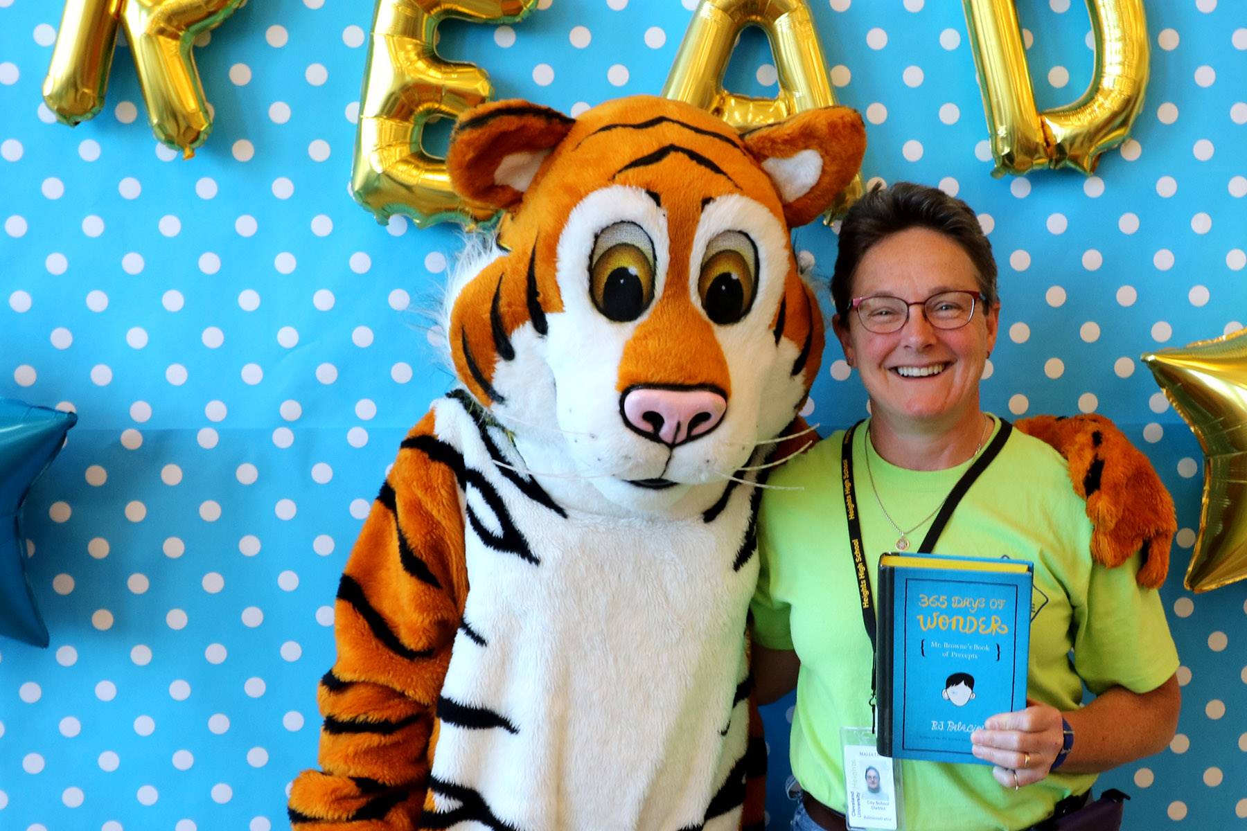 Board Member Malia Lewis and the Tiger at CH-UH Family Literacy Night