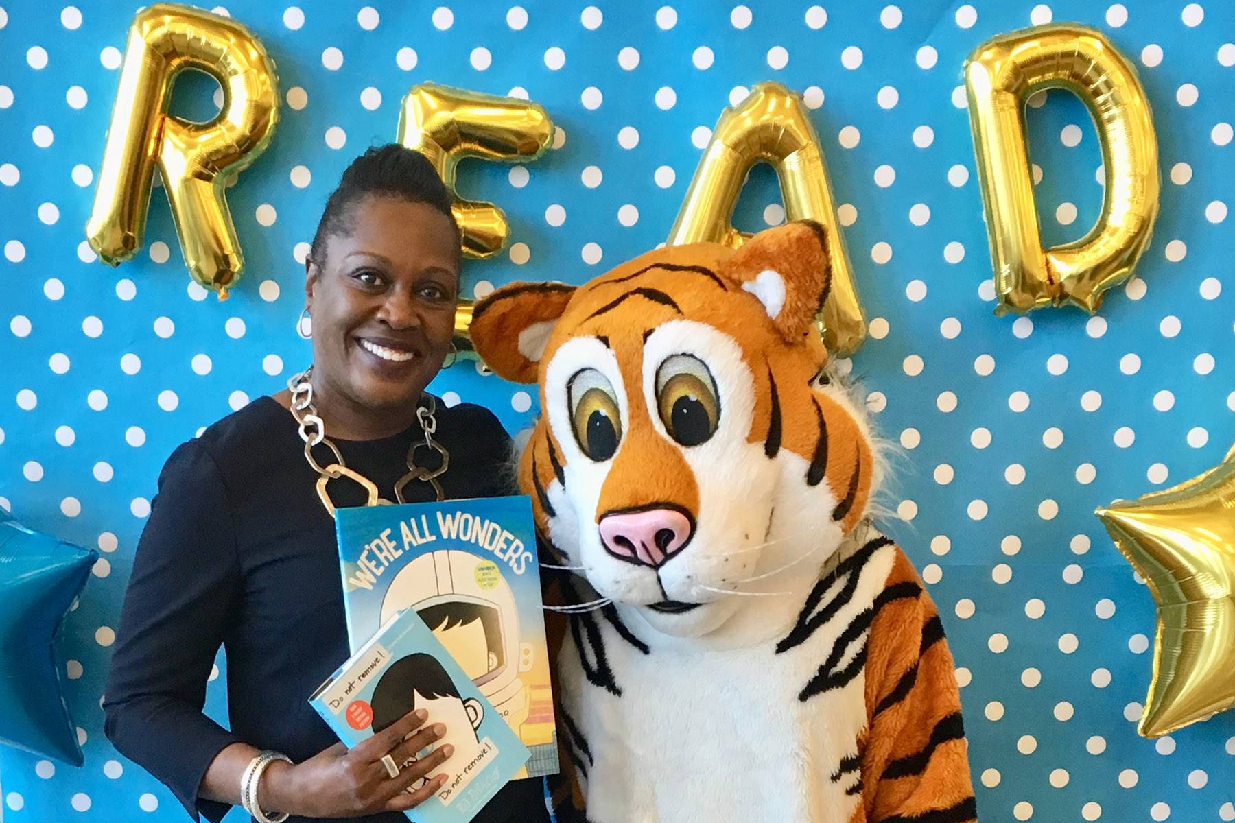 Superintendent Dr. Talisa Dixon and the Tiger at CH-UH Family Literacy Night