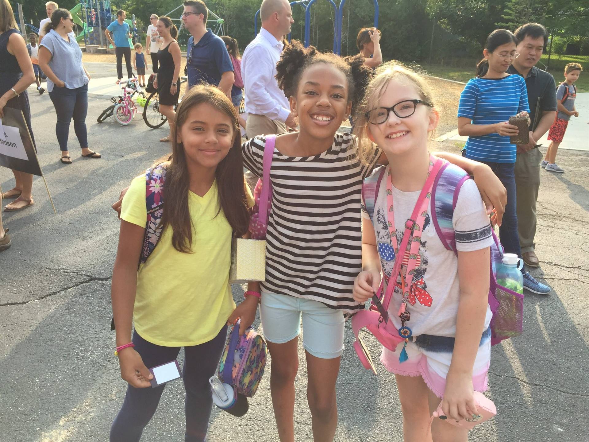 Three girls smiling