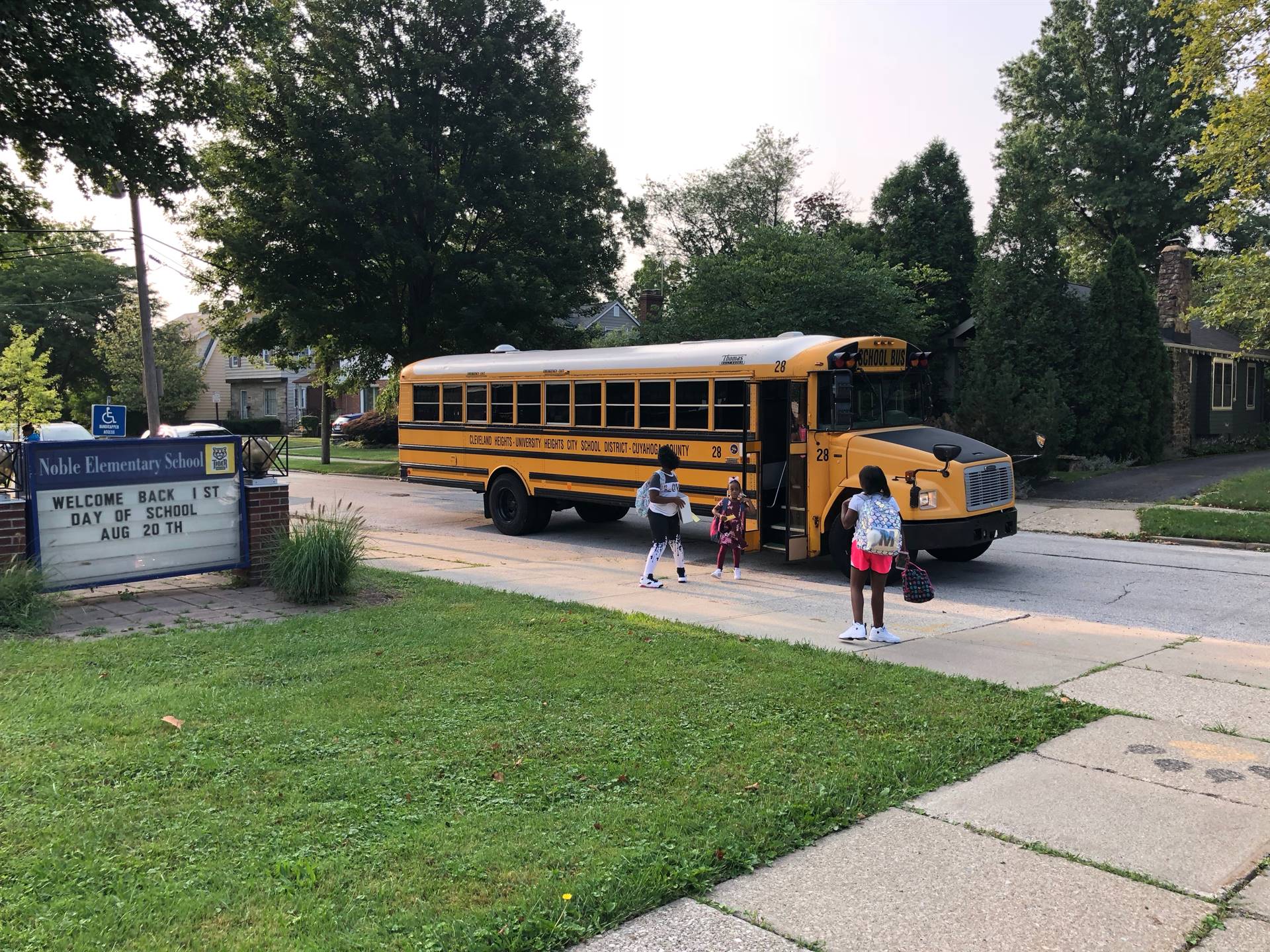 Students getting off bus