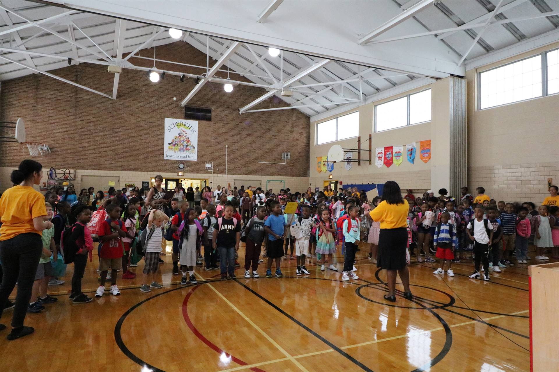 Principal talking to students