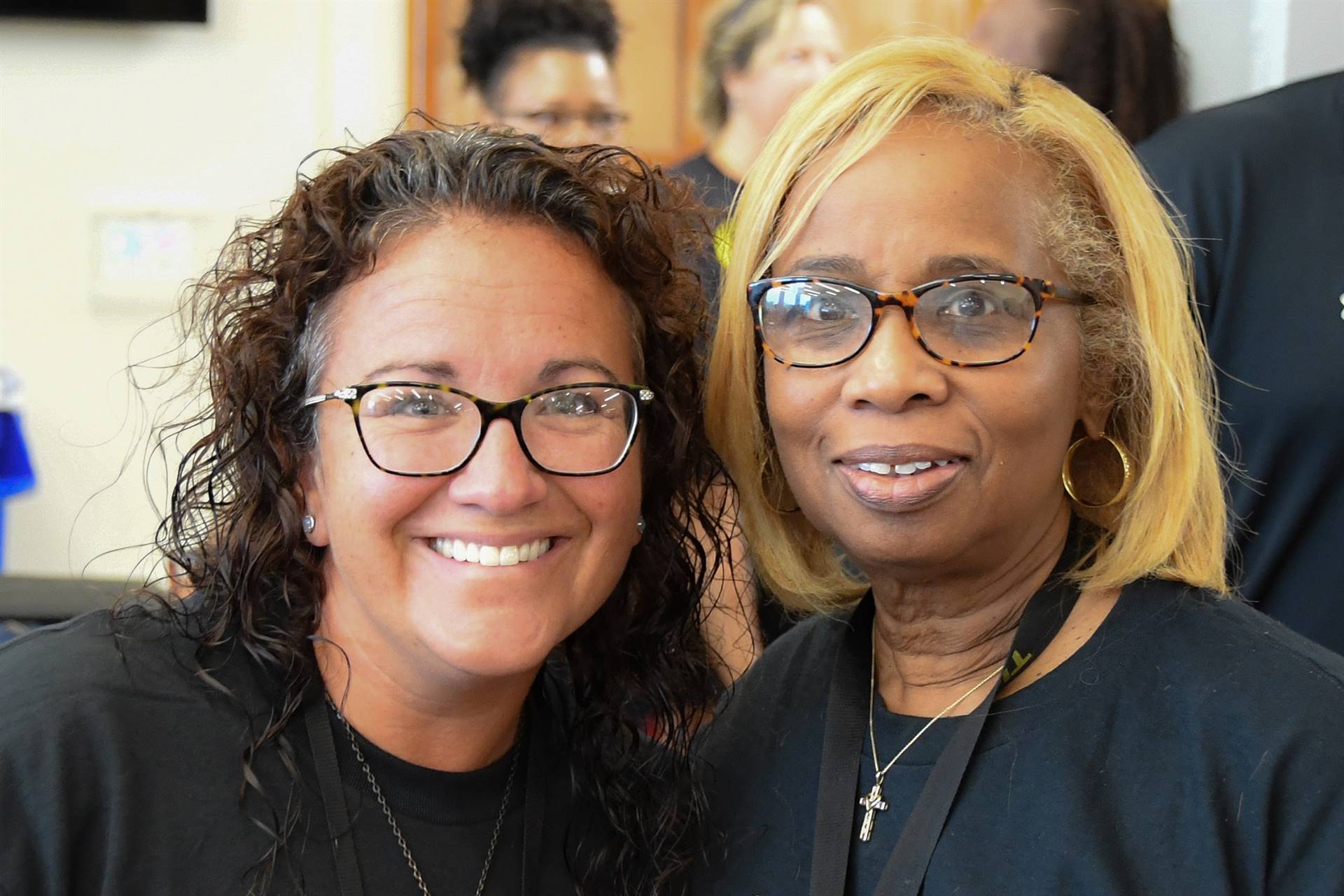 Two women smiling