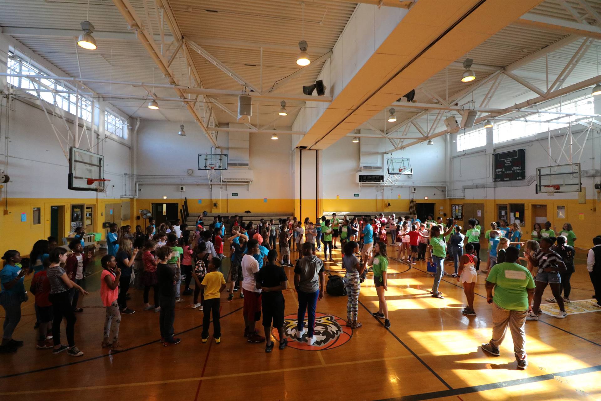 Students gathered on gym floor
