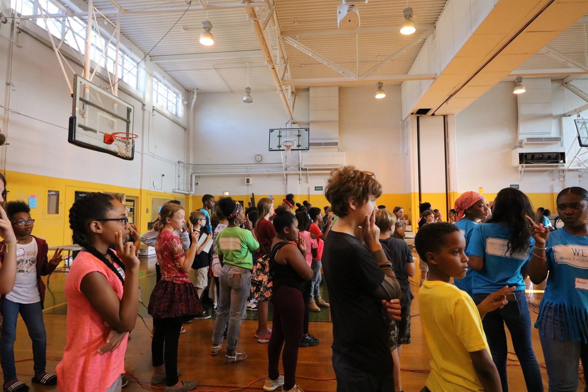 Students gathered on gym floor