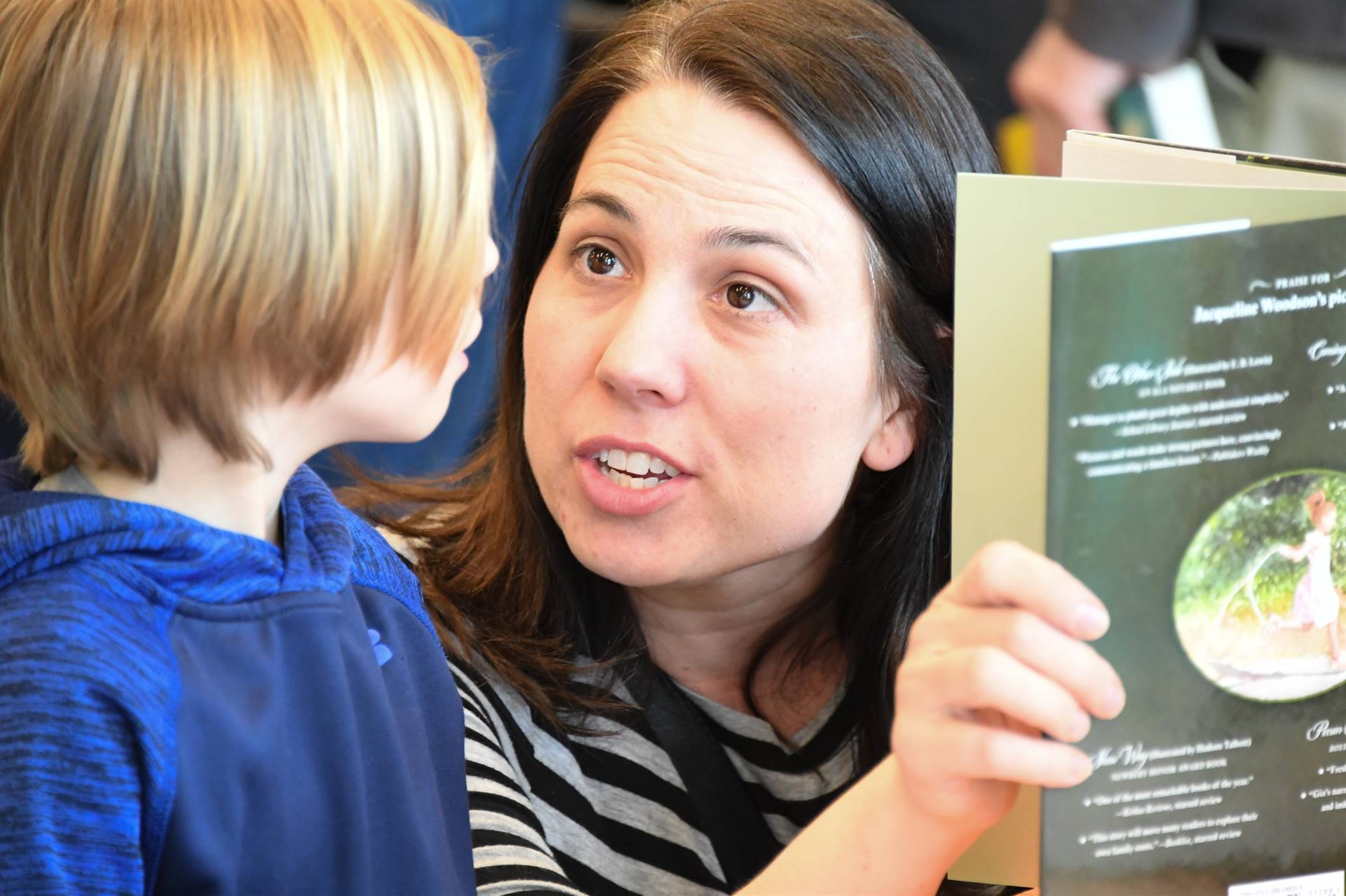 Woman reading with child