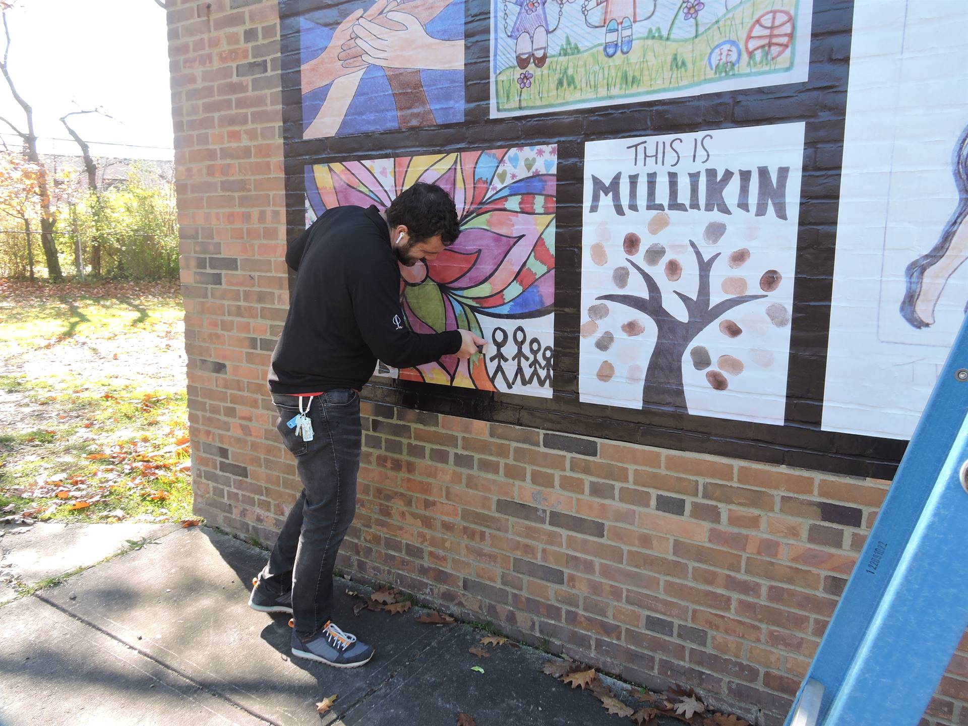 Studio Art Students Paint Millikin Mural