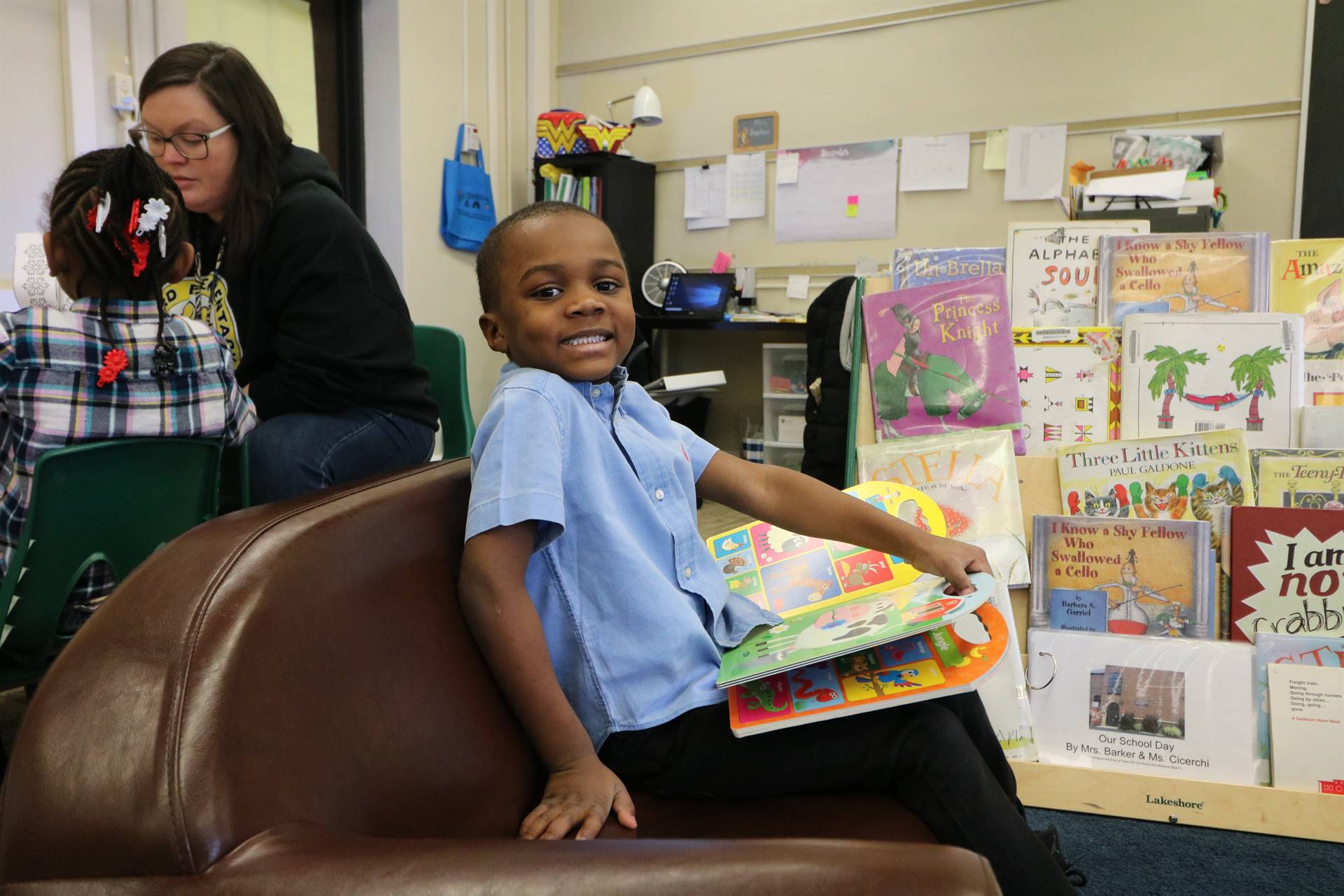 boy sitting with book